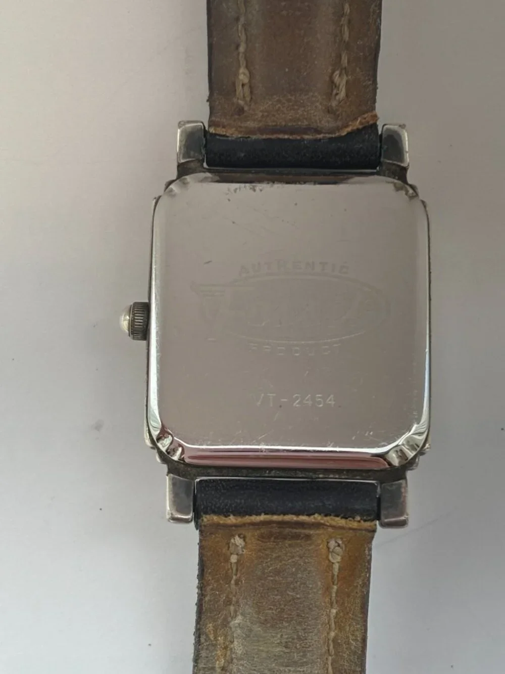 Vintage Fossil watch in Art Deco style with silver bezel and square face